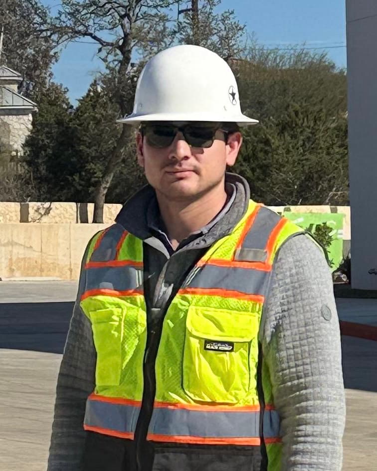 Daniel, owner of AiQ Contractor Systems, on a commercial jobsite in San Antonio.